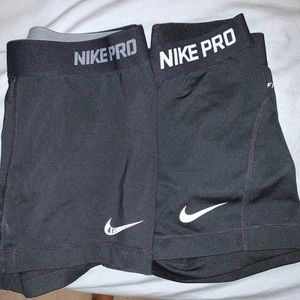 2 pairs of Nike Pro Spandex